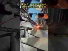 Hand-held laser welding machine welding stainless steel metal fire pipe.